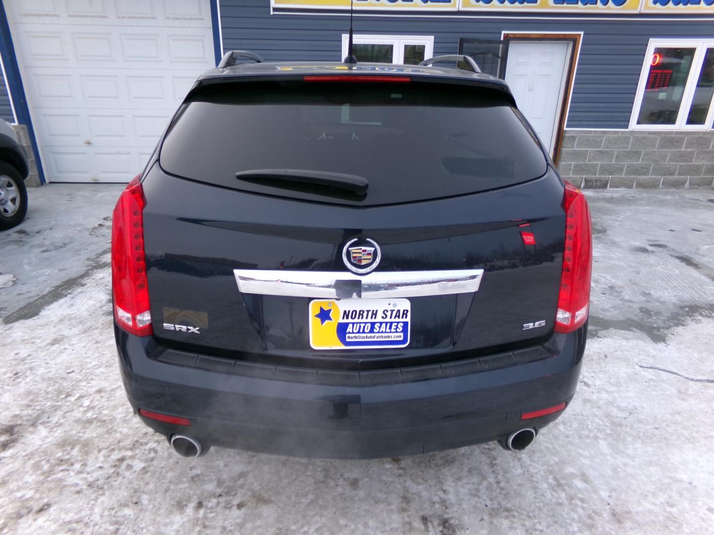 2014 Black Cadillac SRX Performance Collection FWD (3GYFNCE37ES) with an 3.6L V6 DOHC 24V FFV engine, 6-Speed Automatic transmission, located at 2630 Philips Field Rd., Fairbanks, AK, 99709, (907) 458-0593, 64.848068, -147.780609 - Photo#3